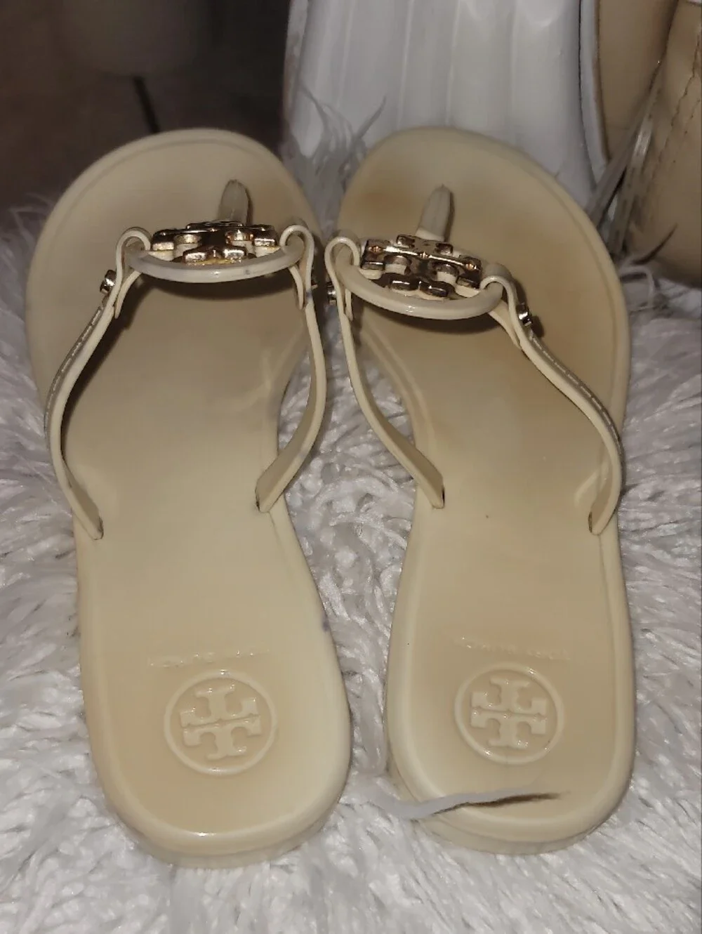 Tory Burch Ivory Logo T-Strap Jelly Sandals with Gold Accent